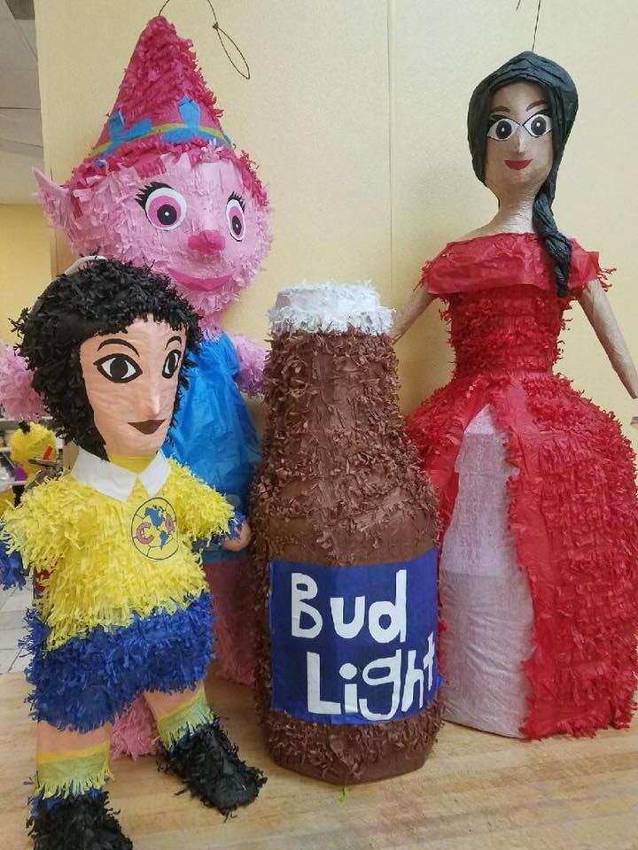 Colorful traditional pinatas at La Popular Panaderia